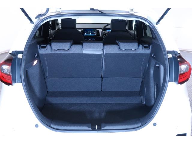 フィット ｅ：ＨＥＶＲＳ　ワンオーナー　ナビ　Ｂカメラ　ドラレコ　運転支援　エアバッグ　パワーウィンドウ　助手席エアバッグ　Ｄレコ　フルセグテレビ　ＬＥＤヘッドランプ　セキュリティアラーム　フルオートエアコン　ＥＴＣ装備　半革（25枚目）