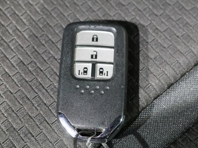 ステップワゴンスパーダ スパーダホンダセンシング 運転支援機能 衝突軽減ブレーキ 禁煙車 LEDヘッドライト 両側電動スライドドア 純正ナビ バックカメラ Bluetooth接続 ミュージックラック ドライブレコーダーETC 盗難防止 ワンオーナ-(18枚目)