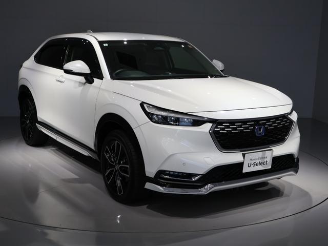 ヴェゼル ｅ：ＨＥＶＺ　禁煙車　運転支援機能　衝突軽減ブレーキ　パワーテールゲート　ＬＥＤヘッドライト　　障害物センサー　純正ナビ　バックカメラ　Ｂｌｕｅｔｏｏｔｈ接続　ミュージックラック　ＥＴＣ　先進ライト　スマキ　Ｄレコ（10枚目）