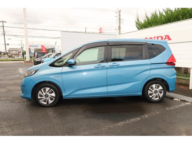 フリードハイブリッド ハイブリッド・Ｇホンダセンシング　軽減ブレーキ　キーフリーシステム　１オ－ナ－　記録簿　ＤＶＤ再生可能　ＥＣＯＮ　禁煙　後カメラ　Ａクルーズ　地デジフルセグＴＶ　ＬＥＤヘッドランプ　横滑防止　ＥＴＣ付（5枚目）