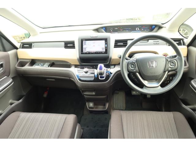 フリードハイブリッド ハイブリッド・Ｇホンダセンシング　軽減ブレーキ　キーフリーシステム　１オ－ナ－　記録簿　ＤＶＤ再生可能　ＥＣＯＮ　禁煙　後カメラ　Ａクルーズ　地デジフルセグＴＶ　ＬＥＤヘッドランプ　横滑防止　ＥＴＣ付（20枚目）