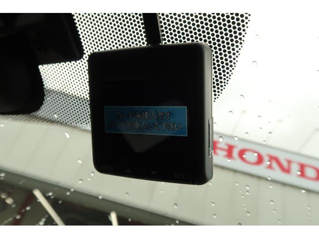 フリードハイブリッド ハイブリッド・Ｇホンダセンシング　軽減ブレーキ　キーフリーシステム　１オ－ナ－　記録簿　ＤＶＤ再生可能　ＥＣＯＮ　禁煙　後カメラ　Ａクルーズ　地デジフルセグＴＶ　ＬＥＤヘッドランプ　横滑防止　ＥＴＣ付（29枚目）
