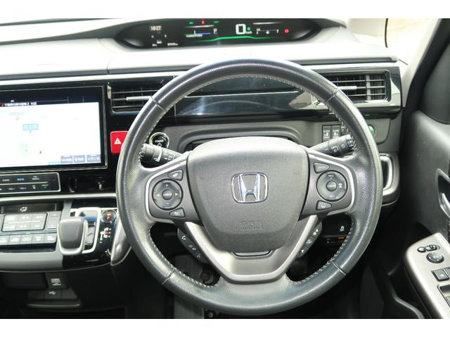 ステップワゴンスパーダ スパーダハイブリッドGホンダセンシング 認定中古車 リヤカメラ付ナビ ETC オートリトラミラー ドライブレコーダー 16インチアルミ 禁煙車 CMBS スマキー Aストップ ESC USB入力 両側自動ドア オートエアコン 地デジ 記録簿(27枚目)