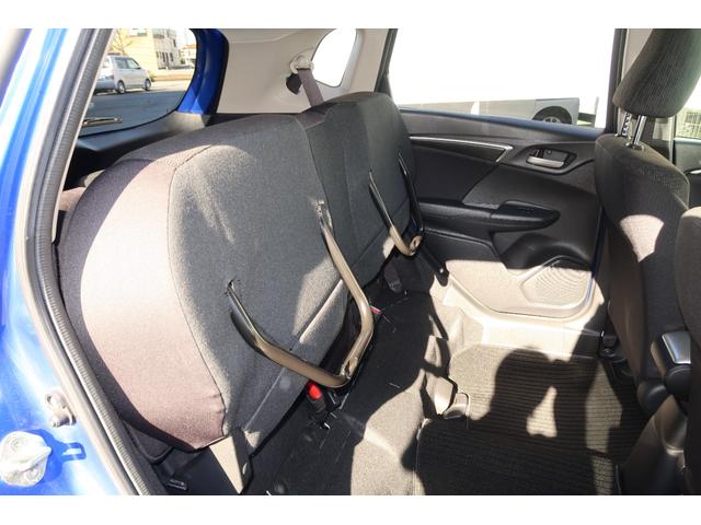 フィット １３Ｇ・Ｓパッケージ　認定中古車　リアカメラ付社外ナビ　社外ドライブレコーダー　１５インチアルミ　ＥＴＣ　ワンオーナー　禁煙車　カーテンエアバッグ　ＤＶＤ再生可　キーレス　フルセグテレビ　ナビ＆ＴＶ　オートエアコン　ＡＢＳ（34枚目）