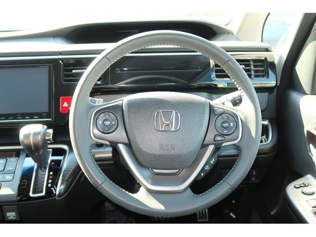 ステップワゴンスパーダ スパーダ・クールスピリットホンダセンシング サイドエアバック スマートキ 左右電動スライドドア バックモニタ Wエアコン 地TV ナビ&TV 助手席エアバッグ AAC 横滑り防止機能 ターボ車 三列シート ドライブレコーダ シートヒータ ABS(28枚目)