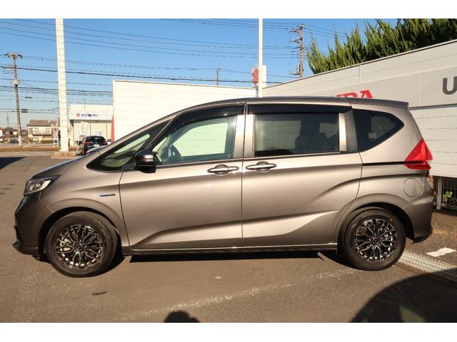 フリードハイブリッド ハイブリッド・Gホンダセンシング キーフリーシステム 後カメラ 地デジフルセグTV パワーウインドウ ETC付 ナビTV パワステ オートエアコン ABS スマキ- 両Pスラドア 軽減ブレーキ 1オ-ナ- 記録簿 DVD再生可能 禁煙(5枚目)