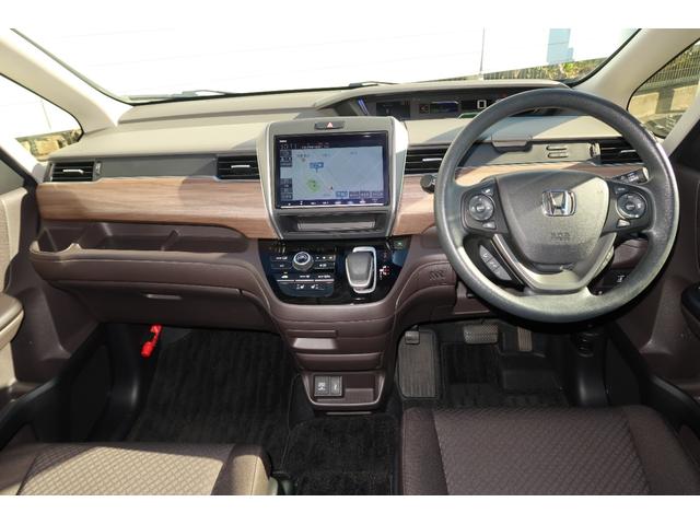 フリードハイブリッド ハイブリッド・Gホンダセンシング キーフリーシステム 後カメラ 地デジフルセグTV パワーウインドウ ETC付 ナビTV パワステ オートエアコン ABS スマキ- 両Pスラドア 軽減ブレーキ 1オ-ナ- 記録簿 DVD再生可能 禁煙(20枚目)