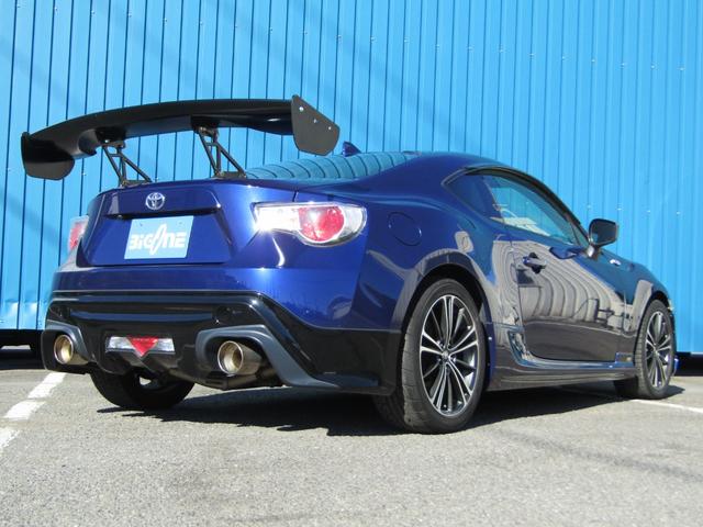 86 GT 6速 マニュアル フルエアロ フジツボマフラー 大型ウイング バックカメラ Bluetooth対応 純正ナビ 地デジ視聴 CD再生 ETC スマキー プッシュスタート ドラレコ HIDヘッドライト(56枚目)