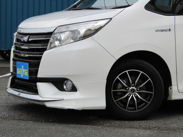 ノア ハイブリッドＧ　ユーザー買取車　パワスラ　フリップダウンモニター　Ｂｌｕｅｔｏｏｔｈ対応　純正ナビ　ＣＤ・ＤＶＤ　フルセグ視聴　モデリスタエアロ　シートヒーター　ビルトインＥＴＣ　社外ＡＷ　プッシュスタート　スマキー（12枚目）