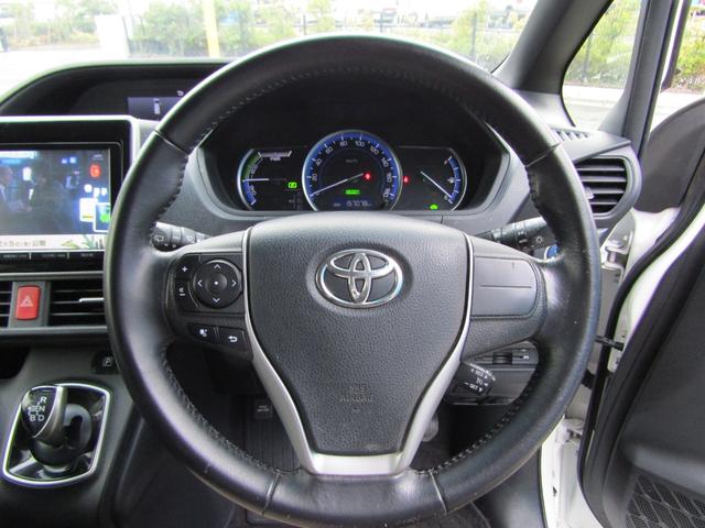 ノア ハイブリッドＧ　ユーザー買取車　パワスラ　フリップダウンモニター　Ｂｌｕｅｔｏｏｔｈ対応　純正ナビ　ＣＤ・ＤＶＤ　フルセグ視聴　モデリスタエアロ　シートヒーター　ビルトインＥＴＣ　社外ＡＷ　プッシュスタート　スマキー（24枚目）
