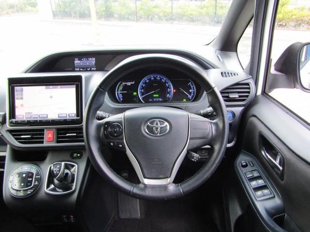 ノア ハイブリッドＧ　ユーザー買取車　パワスラ　フリップダウンモニター　Ｂｌｕｅｔｏｏｔｈ対応　純正ナビ　ＣＤ・ＤＶＤ　フルセグ視聴　モデリスタエアロ　シートヒーター　ビルトインＥＴＣ　社外ＡＷ　プッシュスタート　スマキー（29枚目）