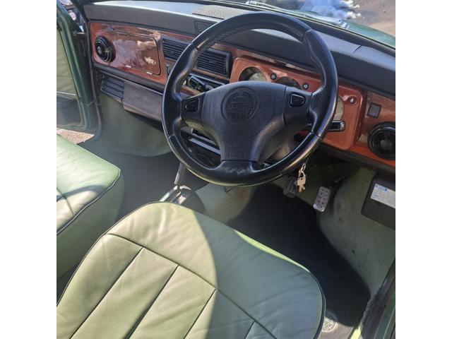 ＭＩＮＩ クーパー　正規輸入ディーラー車、グリーン革シート＆ウッドパネルインテリア＆純正革巻きステアリング＆ＳＲＳ＆純正ＡＷ＆社外キーレスエントリー＆ＥＴＣ＆社外ＣＤプレーヤー付き（15枚目）