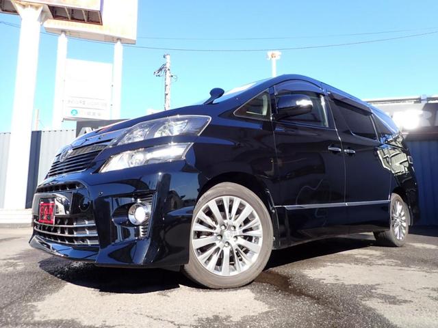 2.4Z ゴールデンアイズII 禁煙車 純正大型ナビ 純正大型後席モニタ AC100V バックカメラ 両側パワスラ Blu-ray対応 TVキャンセラ パワーバックドア ハーフレザーシート クリアランスソナ ウッド調コンビハンドル(45枚目)