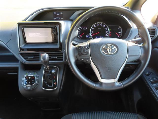 ヴォクシー ＺＳ　煌　ＴＳＳ　両側パワードア　アイドリングストップ車　パワーウィンド　横滑防止　ＤＶＤ可　フルフラットシート　盗難防止装置　スマートエントリー　Ｂカメラ　ＡＵＸ　ＬＥＤヘッドライト　メモリーナビ　３列シート（2枚目）