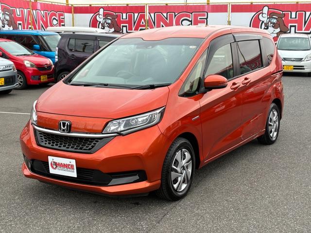 フリードハイブリッド ハイブリッド・Gホンダセンシング ETC スマートキー 両側パワースライドドア LEDヘッドランプ オートライト シートヒーター 純正メモリーナビ CD DVD再生 Bluetooth接続 バックカメラ ドライブレコーダー(4枚目)