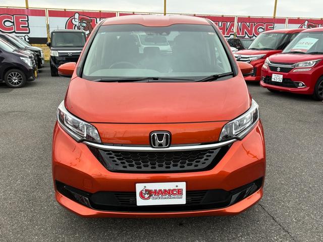 フリードハイブリッド ハイブリッド・Gホンダセンシング ETC スマートキー 両側パワースライドドア LEDヘッドランプ オートライト シートヒーター 純正メモリーナビ CD DVD再生 Bluetooth接続 バックカメラ ドライブレコーダー(5枚目)