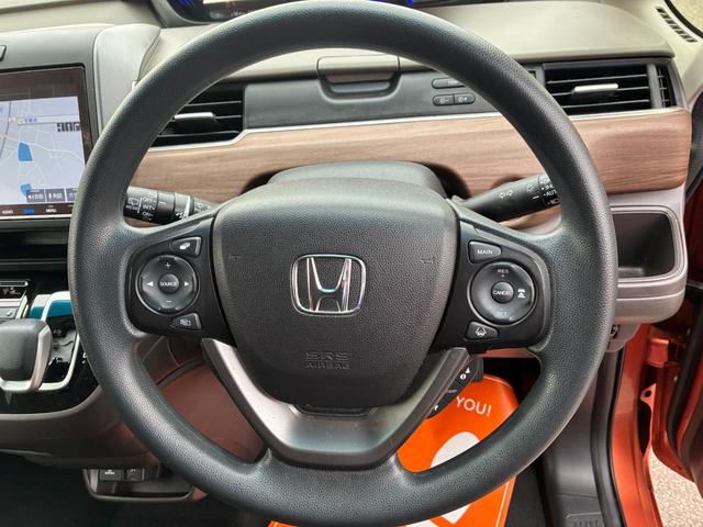 フリードハイブリッド ハイブリッド・Gホンダセンシング ETC スマートキー 両側パワースライドドア LEDヘッドランプ オートライト シートヒーター 純正メモリーナビ CD DVD再生 Bluetooth接続 バックカメラ ドライブレコーダー(18枚目)