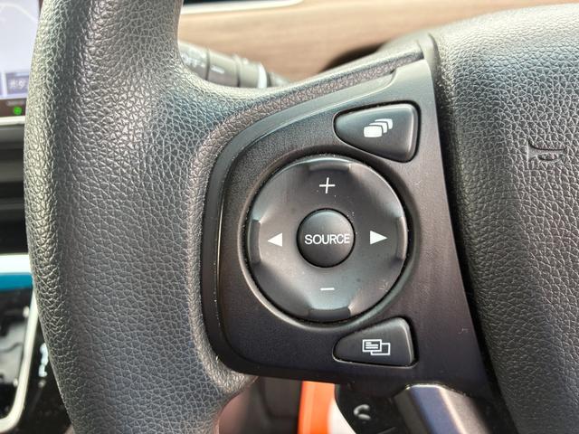 フリードハイブリッド ハイブリッド・Gホンダセンシング ETC スマートキー 両側パワースライドドア LEDヘッドランプ オートライト シートヒーター 純正メモリーナビ CD DVD再生 Bluetooth接続 バックカメラ ドライブレコーダー(19枚目)