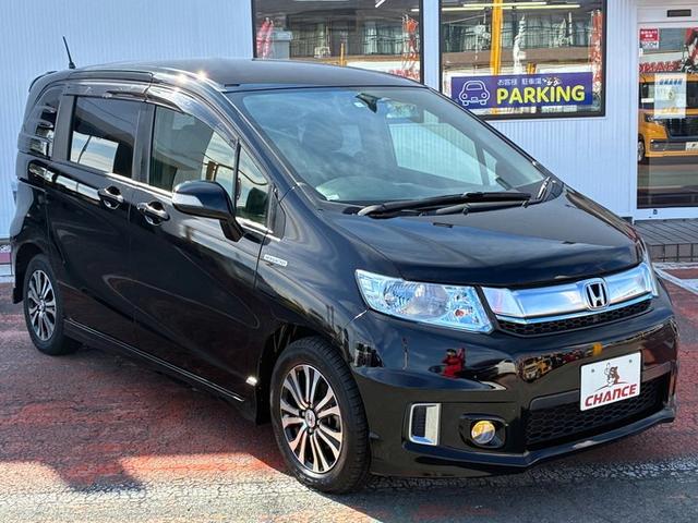 フリードスパイクハイブリッド ジャストセレクション　純正メモリーナビ　ＣＤ　ＤＶＤ　ワンセグＴＶ　両側パワースライドドア　バックカメラ　ＥＴＣ　クルーズコントロール　ドライブレコーダー　ＨＩＤ　フォグランプ　オートライト　電動格納ミラー　スマートキー（6枚目）