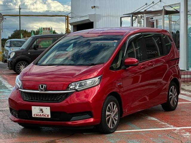 フリードハイブリッド ハイブリッド・Gホンダセンシング メモリーナビ CD DVD フルセグTV Bluetooth ETC 横滑り防止 クルーズコントロール 両側パワースライドドア バックカメラ ホンダセンシング ドライブレコーダー スマートキー(4枚目)