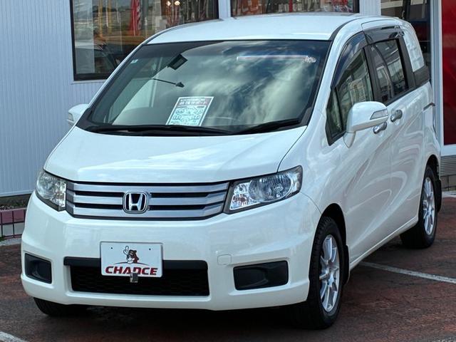 フリードスパイク GL 純正メモリーナビ ワンセグTV DVD ETC 横滑り防止ブレーキ 両側パワースライドドア ステアリングリモコン オートライト HIDヘッドライト クルーズコントロール スタッドレスタイヤ(4枚目)