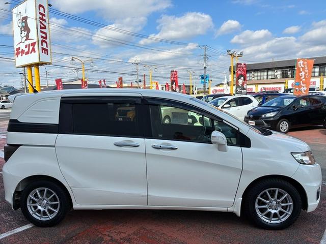 フリードスパイク GL 純正メモリーナビ ワンセグTV DVD ETC 横滑り防止ブレーキ 両側パワースライドドア ステアリングリモコン オートライト HIDヘッドライト クルーズコントロール スタッドレスタイヤ(7枚目)