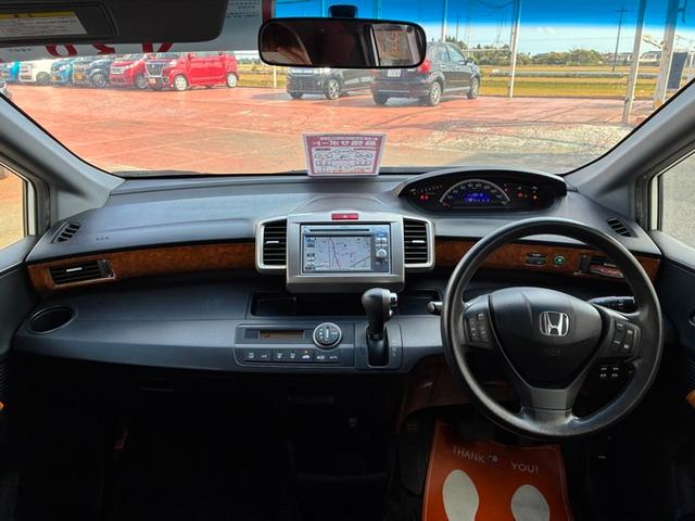 フリードスパイク GL 純正メモリーナビ ワンセグTV DVD ETC 横滑り防止ブレーキ 両側パワースライドドア ステアリングリモコン オートライト HIDヘッドライト クルーズコントロール スタッドレスタイヤ(10枚目)