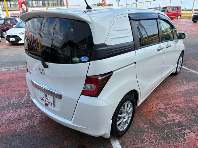 フリードスパイク GL 純正メモリーナビ ワンセグTV DVD ETC 横滑り防止ブレーキ 両側パワースライドドア ステアリングリモコン オートライト HIDヘッドライト クルーズコントロール スタッドレスタイヤ(15枚目)