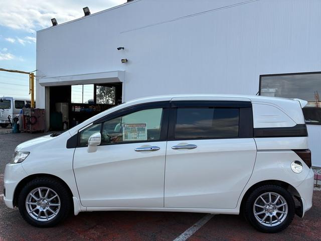 フリードスパイク GL 純正メモリーナビ ワンセグTV DVD ETC 横滑り防止ブレーキ 両側パワースライドドア ステアリングリモコン オートライト HIDヘッドライト クルーズコントロール スタッドレスタイヤ(18枚目)