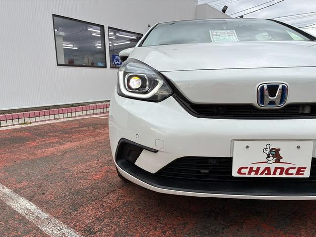 フィット ｅ：ＨＥＶベーシック　純正メモリーナビ　ＣＤ　ＤＶＤ　フルセグＴＶ　Ｂｌｕｅｔｏｏｔｈ　バックカメラ　ＥＴＣ　衝突軽減ブレーキ　レーンキープ　横滑り防止ブレーキ　クリアランスソナー　クルーズコントロール　オートライト（52枚目）