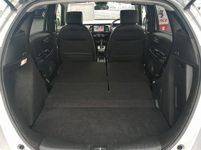 フィット ｅ：ＨＥＶホーム　純正ナビ　フルセグＴＶ　Ｂｌｕｅｔｏｏｔｈ接続　ＥＴＣ　バックカメラ　クルーズコントロール　ＬＥＤヘッドライト　プッシュスタート　スマートキー　ホンダセンシング　ハーフレザーシート（41枚目）