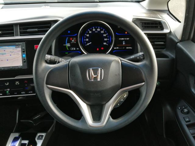 フィットハイブリッド Ｆパッケージ　安全ボディ　ＮＡＶＩ　メモリーナビゲーション　盗難警報装置　ＡＵＴＯエアコン　ＥＣＯＮ　ＡＢＳ付　横滑り防止システム　スマートキー　運転席エアバック　助手席エアバック　パワーステアリング（13枚目）