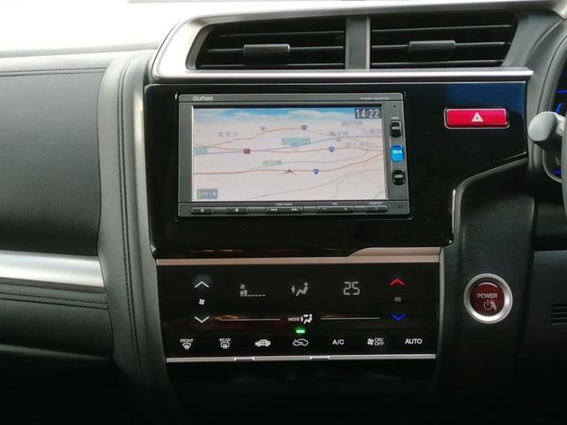 フィットハイブリッド Ｆパッケージ　安全ボディ　ＮＡＶＩ　メモリーナビゲーション　盗難警報装置　ＡＵＴＯエアコン　ＥＣＯＮ　ＡＢＳ付　横滑り防止システム　スマートキー　運転席エアバック　助手席エアバック　パワーステアリング（14枚目）