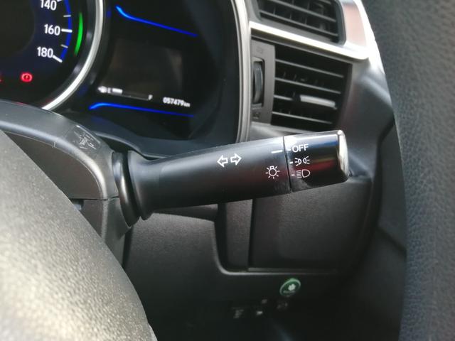 フィットハイブリッド Ｆパッケージ　安全ボディ　ＮＡＶＩ　メモリーナビゲーション　盗難警報装置　ＡＵＴＯエアコン　ＥＣＯＮ　ＡＢＳ付　横滑り防止システム　スマートキー　運転席エアバック　助手席エアバック　パワーステアリング（27枚目）