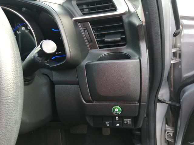 フィットハイブリッド Ｆパッケージ　安全ボディ　ＮＡＶＩ　メモリーナビゲーション　盗難警報装置　ＡＵＴＯエアコン　ＥＣＯＮ　ＡＢＳ付　横滑り防止システム　スマートキー　運転席エアバック　助手席エアバック　パワーステアリング（28枚目）