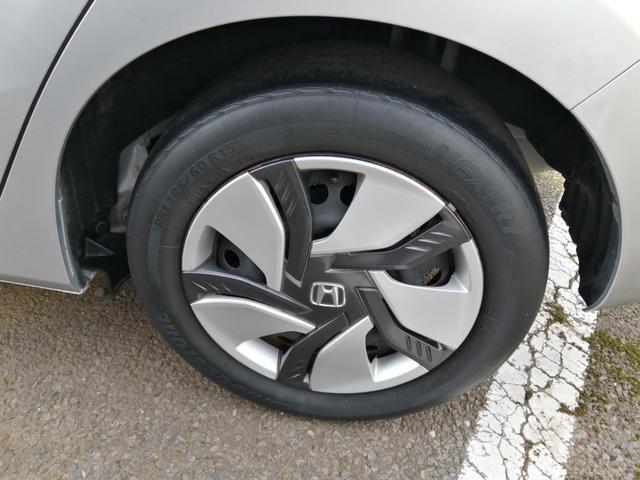フィットハイブリッド Ｆパッケージ　安全ボディ　ＮＡＶＩ　メモリーナビゲーション　盗難警報装置　ＡＵＴＯエアコン　ＥＣＯＮ　ＡＢＳ付　横滑り防止システム　スマートキー　運転席エアバック　助手席エアバック　パワーステアリング（50枚目）