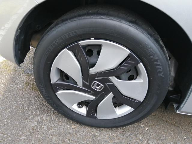 フィットハイブリッド Ｆパッケージ　安全ボディ　ＮＡＶＩ　メモリーナビゲーション　盗難警報装置　ＡＵＴＯエアコン　ＥＣＯＮ　ＡＢＳ付　横滑り防止システム　スマートキー　運転席エアバック　助手席エアバック　パワーステアリング（51枚目）