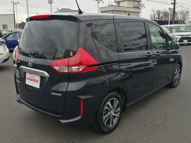 フリードハイブリッド ハイブリッド・Ｇ　社外ナビ　フルセグＴＶ　Ｂｌｕｅｔｏｏｔｈ接続　ＣＤ／ＤＶＤ再生　ＥＴＣ　バックカメラ　シートヒーター　両側パワースライドドア　アイドリングストップ　ＬＥＤヘッド　クルーズコントロール　純正アルミ（8枚目）