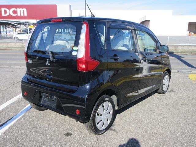 ｅＫワゴン Ｅ　社外ナビ　ワンセグ　電格ミラー　取扱説明書　ベンチシート　フルフラットシート　キーレス　エアバッグ　助手席エアバッグ　ＡＢＳ　インパネＡＴ　ＣＤ　ＤＶＤ　ハロゲン　エアコン　パワステ（7枚目）