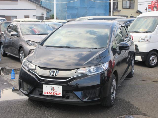 フィットハイブリッド 　メモリーナビ　バックカメラ　Ｂｌｕｅｔｏｏｔｈ　フルフラットシート　スマートキー　ＥＴＣ　横滑り防止装置　ＡＢＳ　エアバッグ　助手席エアバッグ　ＣＤ　ＤＶＤ　ＬＥＤヘッドライト　電格ミラー（3枚目）