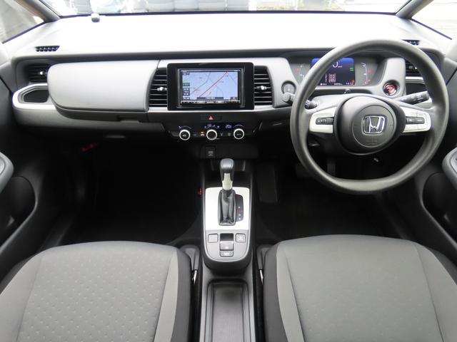 フィット ｅ：ＨＥＶベーシック　バックカメラ　ナビ　クリアランスソナー　オートクルーズコントロール　レーンアシスト　衝突被害軽減システム　オートライト　ＬＥＤヘッドランプ　スマートキー　電動格納ミラー　ＣＶＴ　盗難防止システム（2枚目）