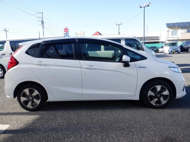 フィットハイブリッド F ハイブリッド ナビ レーンアシスト 衝突被害軽減システム スマートキー 電動格納ミラー AT 盗難防止システム 衝突安全ボディ CD USB Bluetooth ABS ESC エアコン(16枚目)