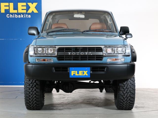 ランドクルーザー80 VXリミテッド VXリミテッドグレード スモーキーブルーペイント ブッシュワーカー風オーバーフェンダー 輸出用角目4灯ヘッドライト 新品ジオランダーMTタイヤ 新品ジムラインAW 新品ブラウンクラシックシートカバー(22枚目)