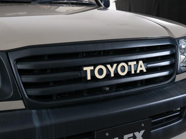 ランドクルーザー100 VXリミテッド Gセレクション ベージュカラーペイント 丸目ヘッドライト 横文字トヨタグリル 鉄チンホイール ARBフラックラック マルチレス HDDサイバーナビ バックカメラ ETC レザー調コンビシートカバー ウッドステアリング(26枚目)