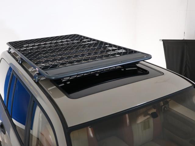 ランドクルーザー100 VXリミテッド Gセレクション ベージュカラーペイント 丸目ヘッドライト 横文字トヨタグリル 鉄チンホイール ARBフラックラック マルチレス HDDサイバーナビ バックカメラ ETC レザー調コンビシートカバー ウッドステアリング(28枚目)