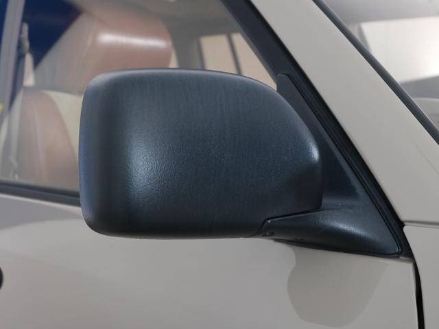 ランドクルーザー100 VXリミテッド Gセレクション ベージュカラーペイント 丸目ヘッドライト 横文字トヨタグリル 鉄チンホイール ARBフラックラック マルチレス HDDサイバーナビ バックカメラ ETC レザー調コンビシートカバー ウッドステアリング(30枚目)