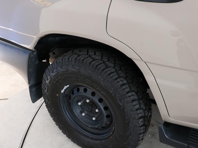 ランドクルーザー100 VXリミテッド Gセレクション ベージュカラーペイント 丸目ヘッドライト 横文字トヨタグリル 鉄チンホイール ARBフラックラック マルチレス HDDサイバーナビ バックカメラ ETC レザー調コンビシートカバー ウッドステアリング(32枚目)