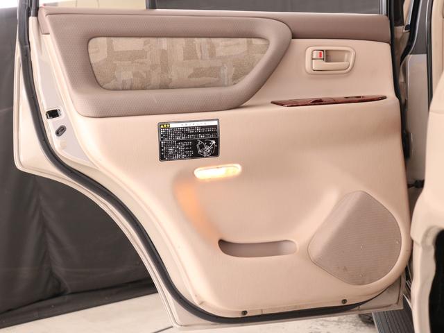 ランドクルーザー100 VXリミテッド Gセレクション ベージュカラーペイント 丸目ヘッドライト 横文字トヨタグリル 鉄チンホイール ARBフラックラック マルチレス HDDサイバーナビ バックカメラ ETC レザー調コンビシートカバー ウッドステアリング(55枚目)