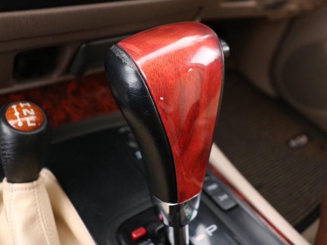 ランドクルーザー100 VXリミテッド Gセレクション ベージュカラーペイント 丸目ヘッドライト 横文字トヨタグリル 鉄チンホイール ARBフラックラック マルチレス HDDサイバーナビ バックカメラ ETC レザー調コンビシートカバー ウッドステアリング(60枚目)