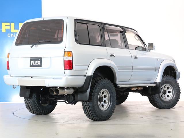 ランドクルーザー８０ 　下取り車　ハイリフト　後期型　新品ジオＭＴタイヤ　社外１６インチＡＷ　カロッツェリア製７インチナビ　ＥＴＣ　ウッドシフトノブ　ウッドステアリング　新品フロントグリル　新品３色テールランプ　サンルーフ（10枚目）